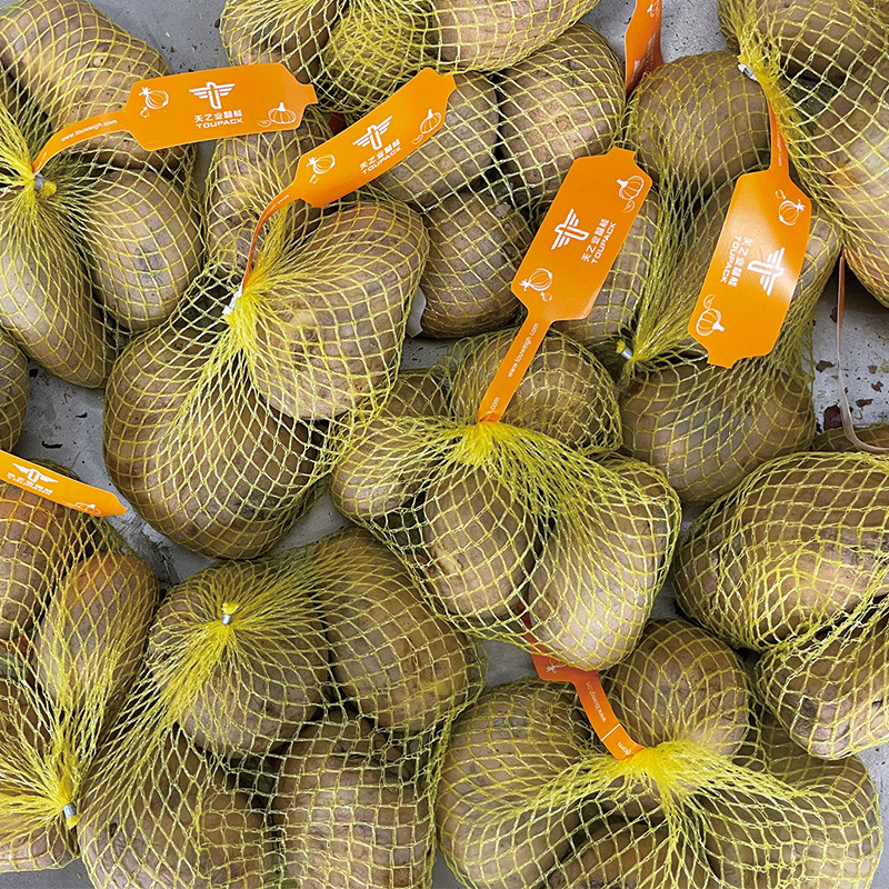 Máy làm túi lưới đóng gói hành, tỏi và khoai tây Máy đóng gói Túi lưới tự động Máy chiết rót cân định lượng đa đầu